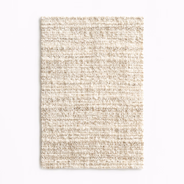 Pale straw-beige Vuk Paille swatch with nubby horizontal woven texture