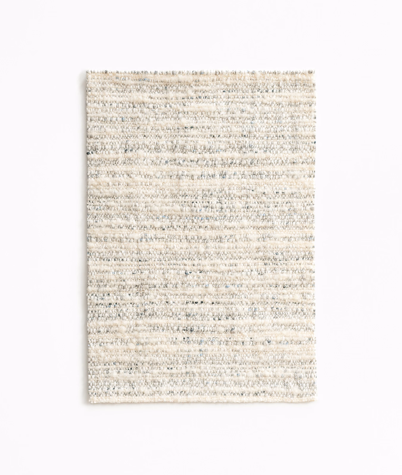 Pale greige Vuk fabric swatch with irregular horizontal nubby weave and grey flecks