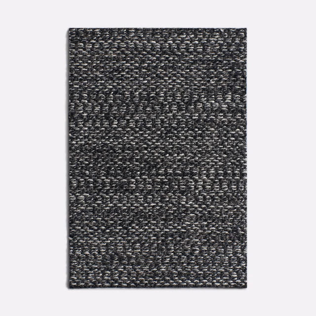Dark charcoal-grey upholstery swatch with dense nubby weave and tonal bands