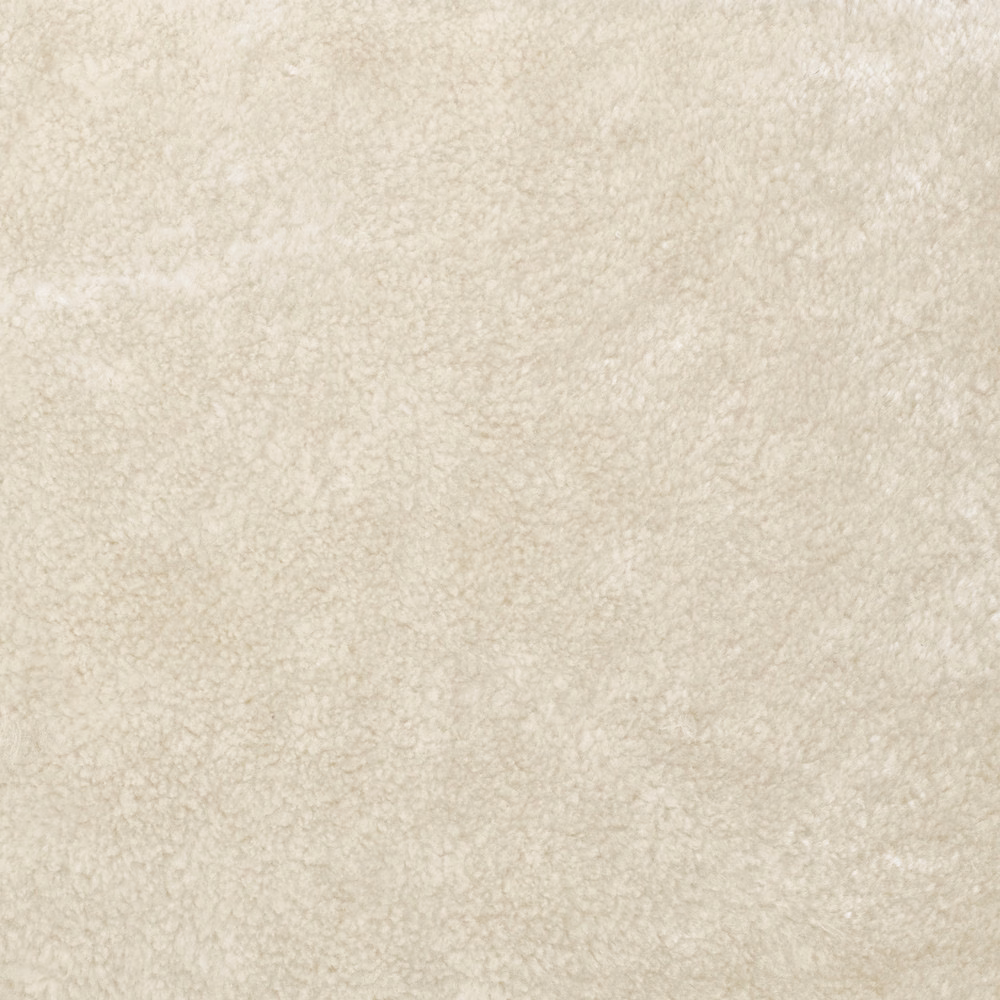 Pale ivory-cream velvet with a cloudy, softly mottled plush surface