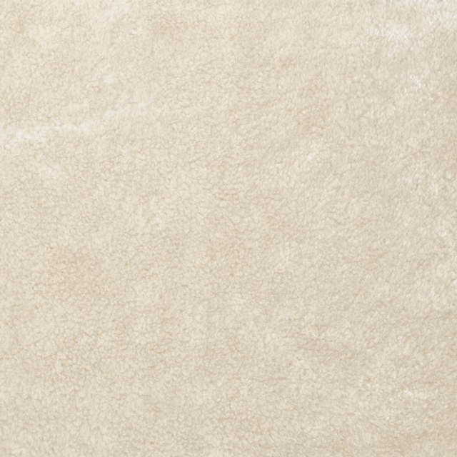 Pale ivory-cream velvet with a cloudy, softly mottled plush surface