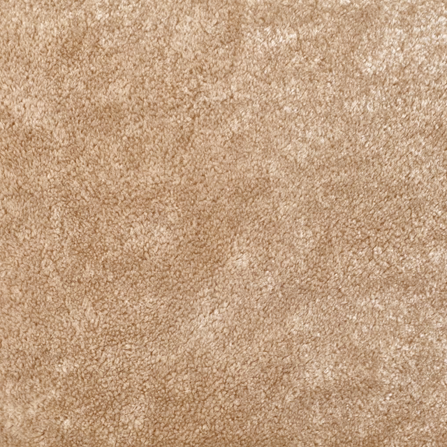 Warm camel-beige velvet swatch with softly flecked, nubby teddy texture