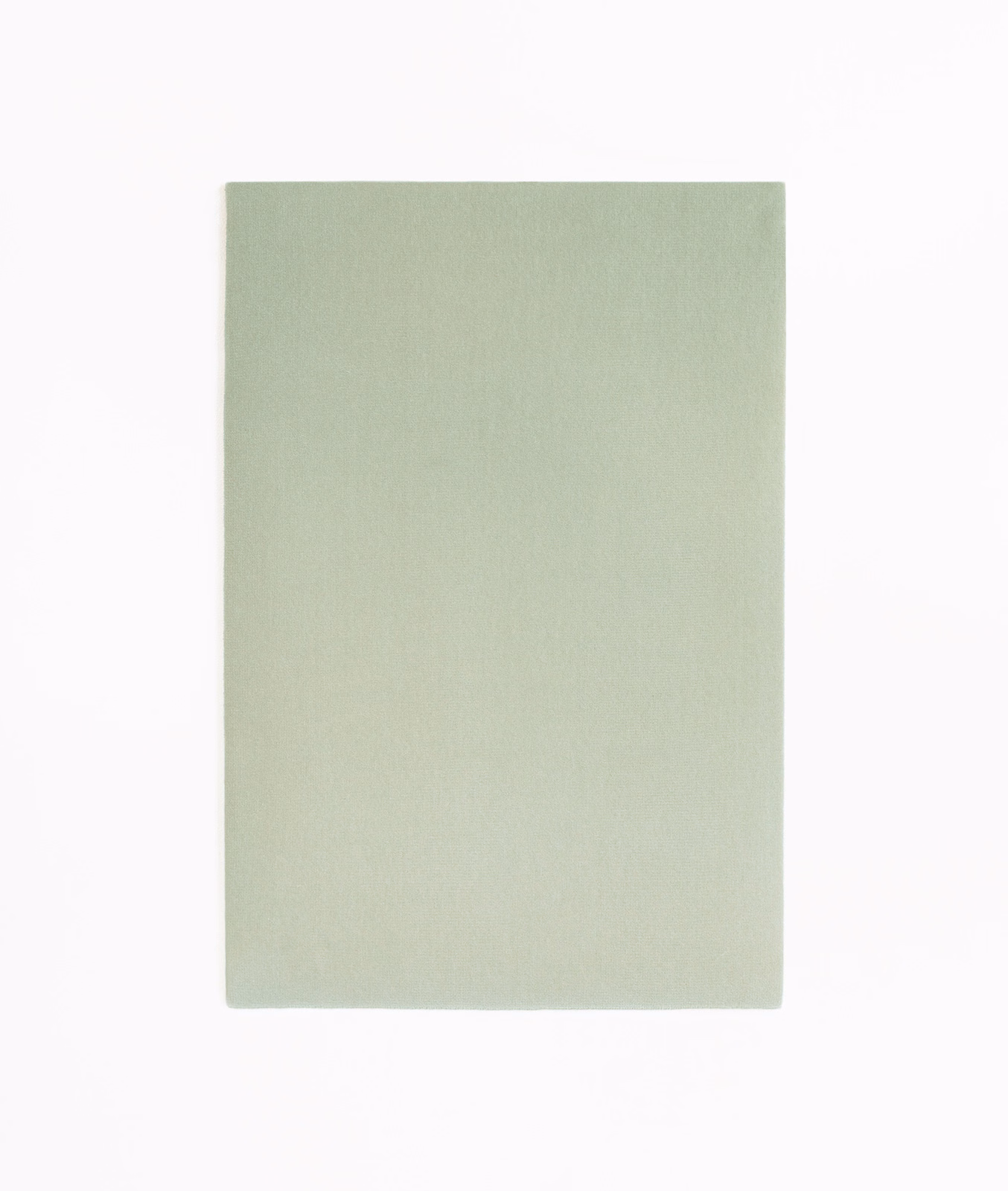 Pale sage-green velvet swatch with a smooth nap and subtle tonal shading