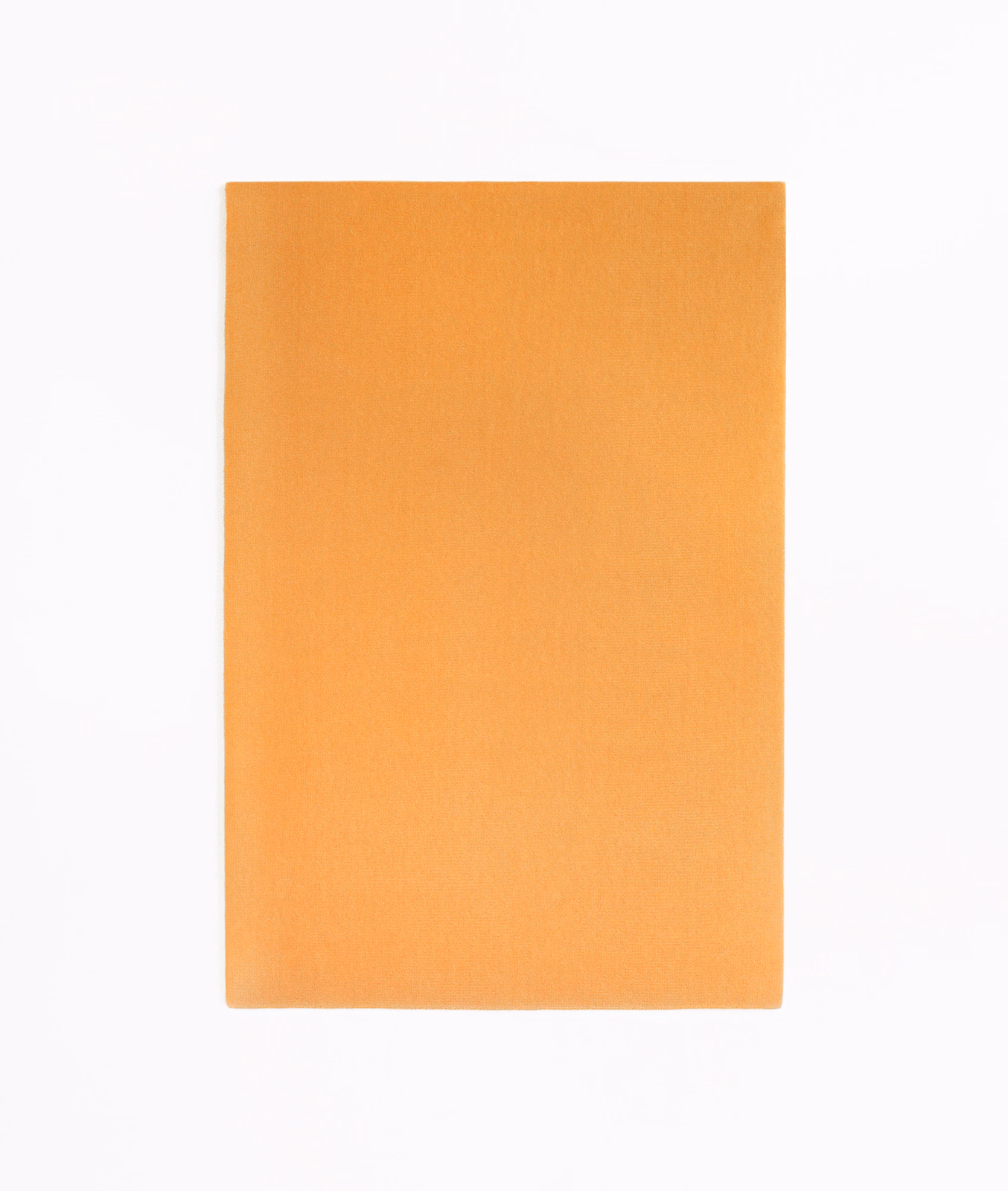 Warm golden-orange velvet swatch showing a smooth, softly shaded nap
