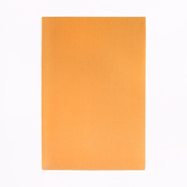 Warm golden-orange velvet swatch showing a smooth, softly shaded nap