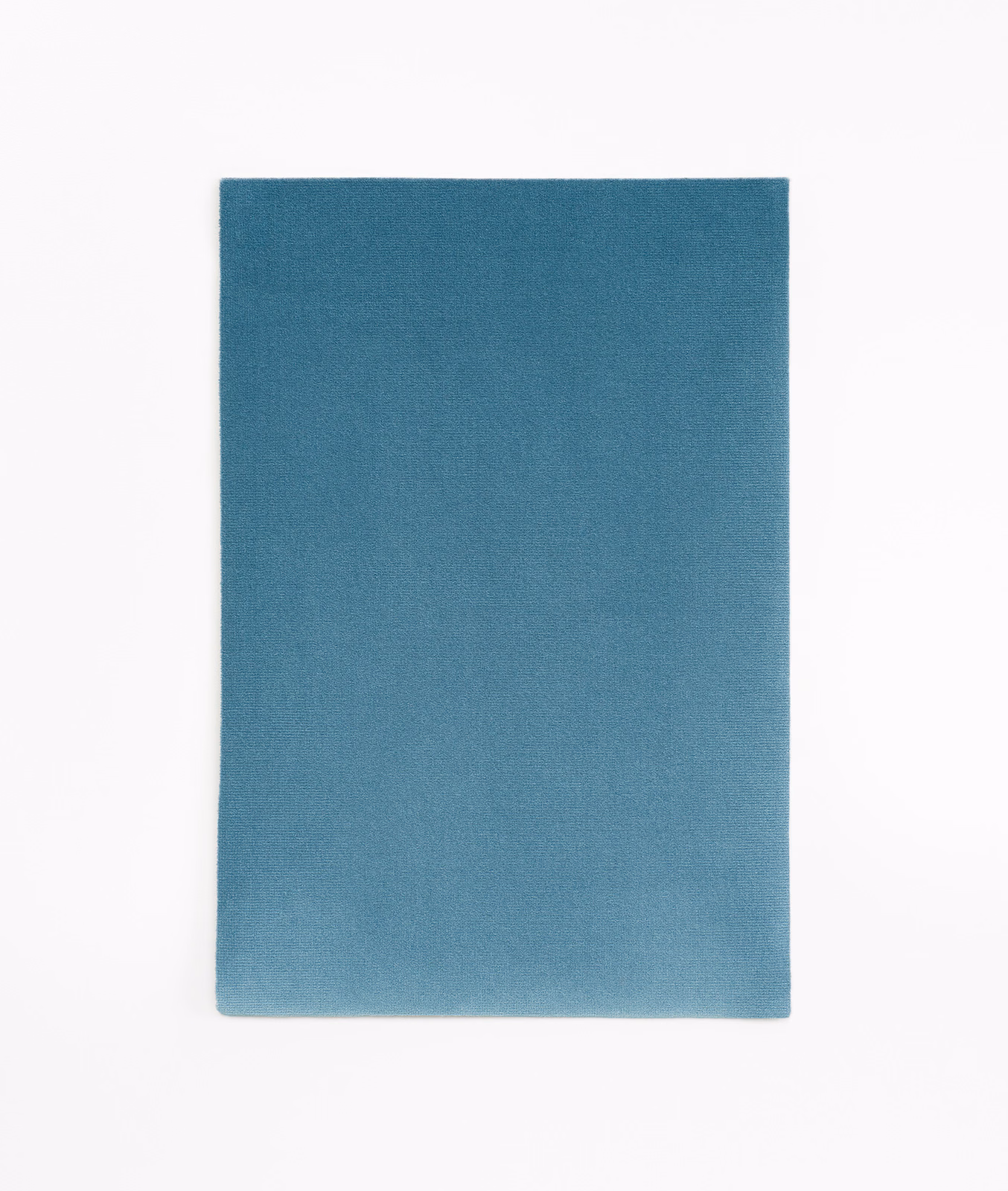Muted avio blue-teal velvet swatch with softly shaded, light-catching nap