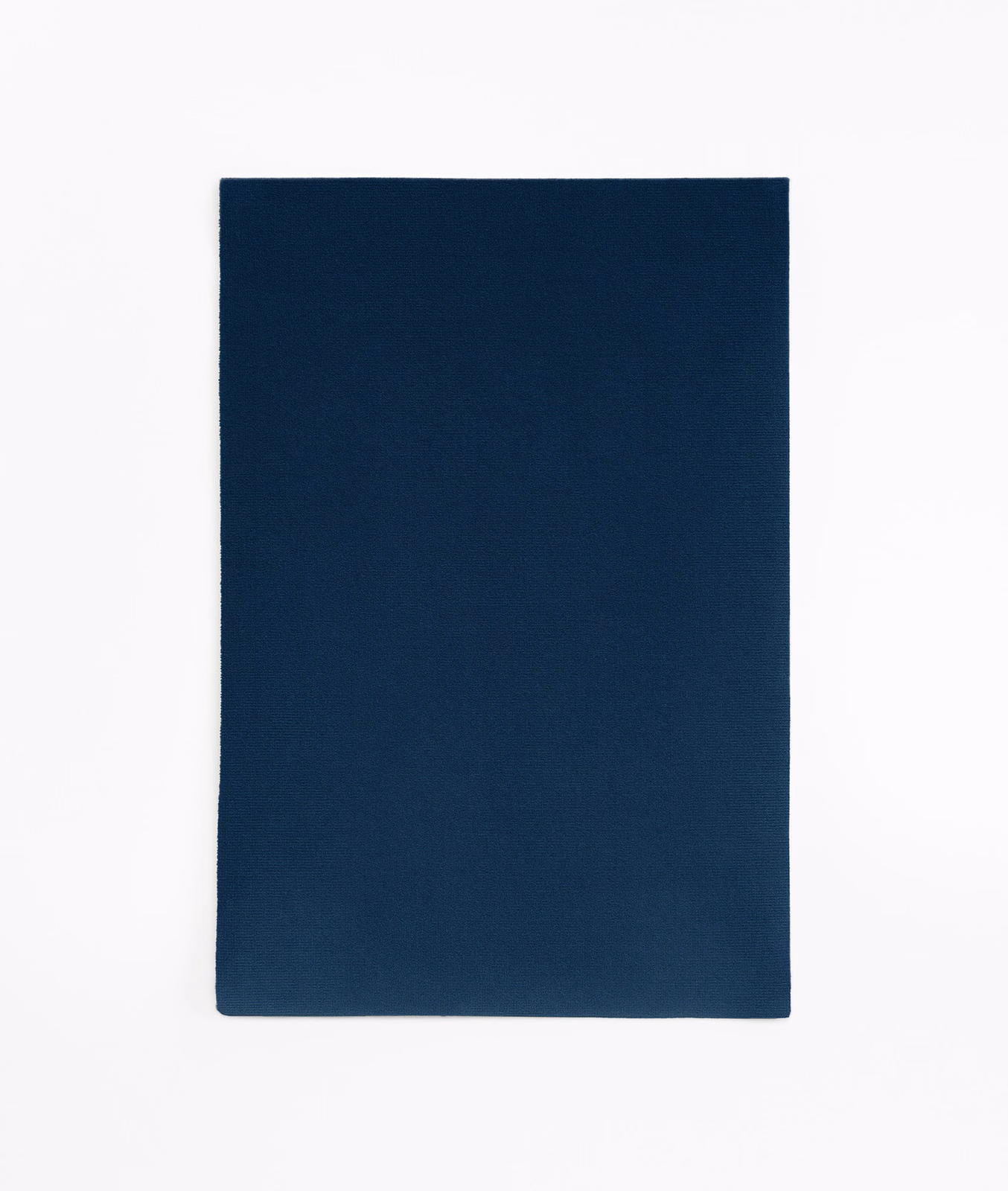Deep Prussian blue velvet swatch with a plain, softly napped surface