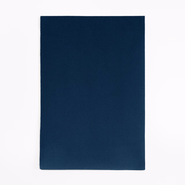Deep Prussian blue velvet swatch with a plain, softly napped surface
