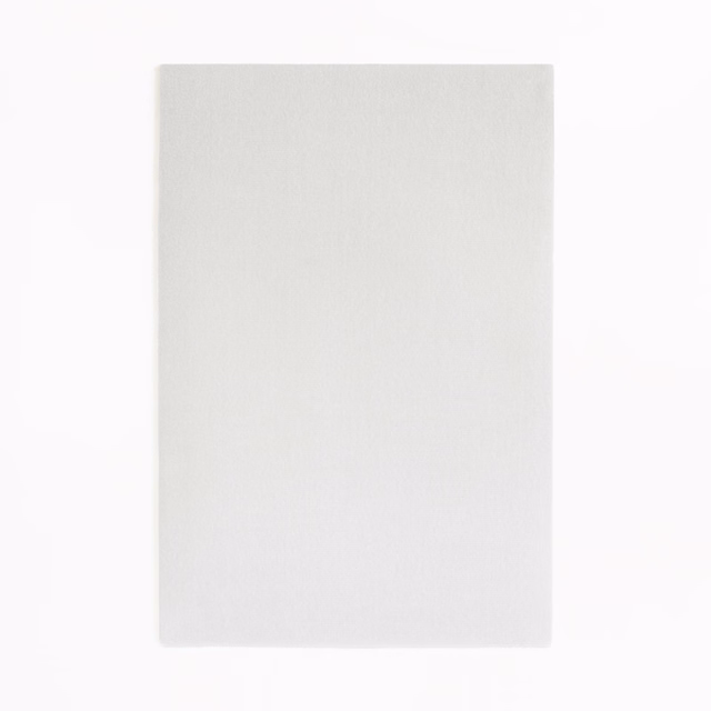 Pale mist-grey velvet swatch with an even, subtly brushed plain surface
