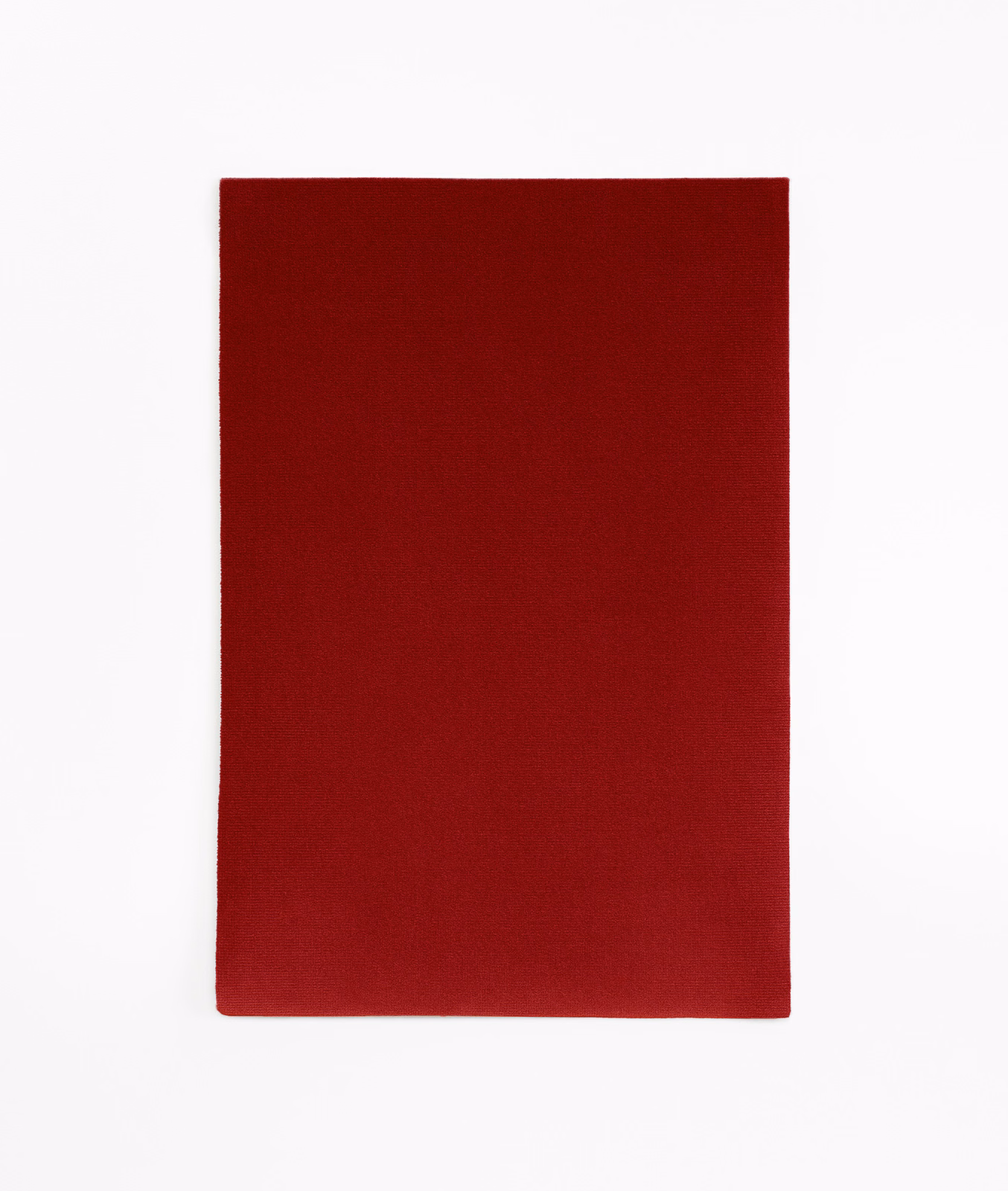 Deep cayenne-red velvet swatch with a plain, subtly light-catching nap
