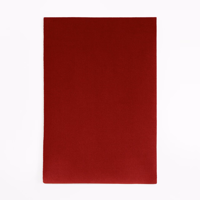 Deep cayenne-red velvet swatch with a plain, subtly light-catching nap
