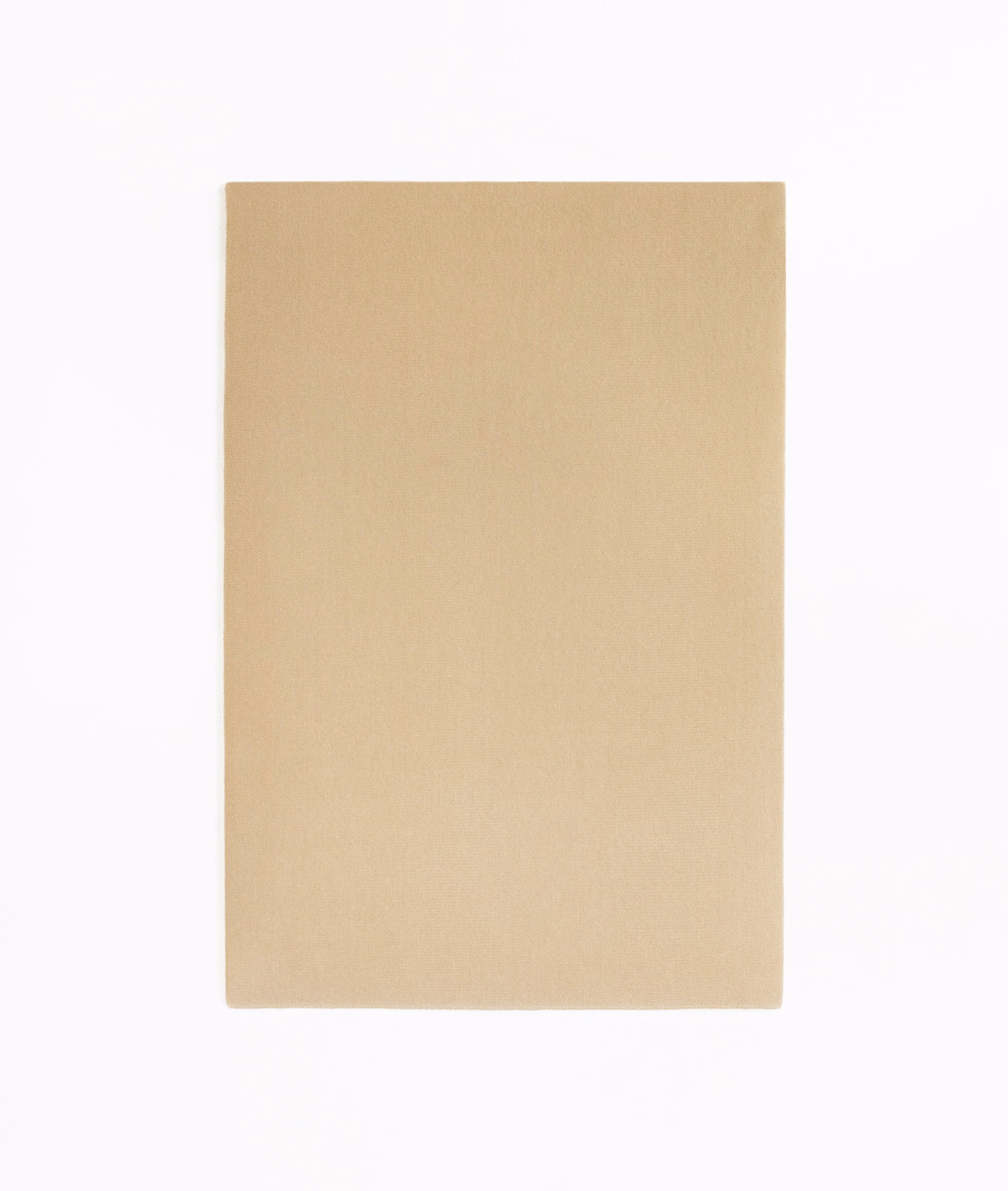 Warm dune-beige velvet swatch with a smooth, subtly directional nap