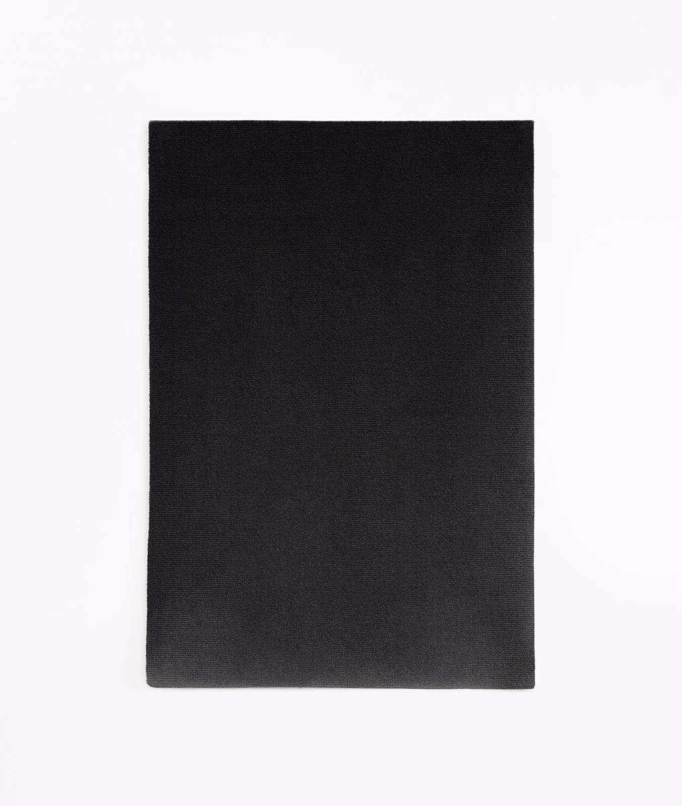Near-black charcoal velvet swatch with a subtly light-catching, even pile