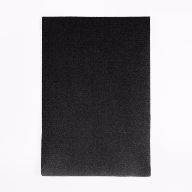 Near-black charcoal velvet swatch with a subtly light-catching, even pile