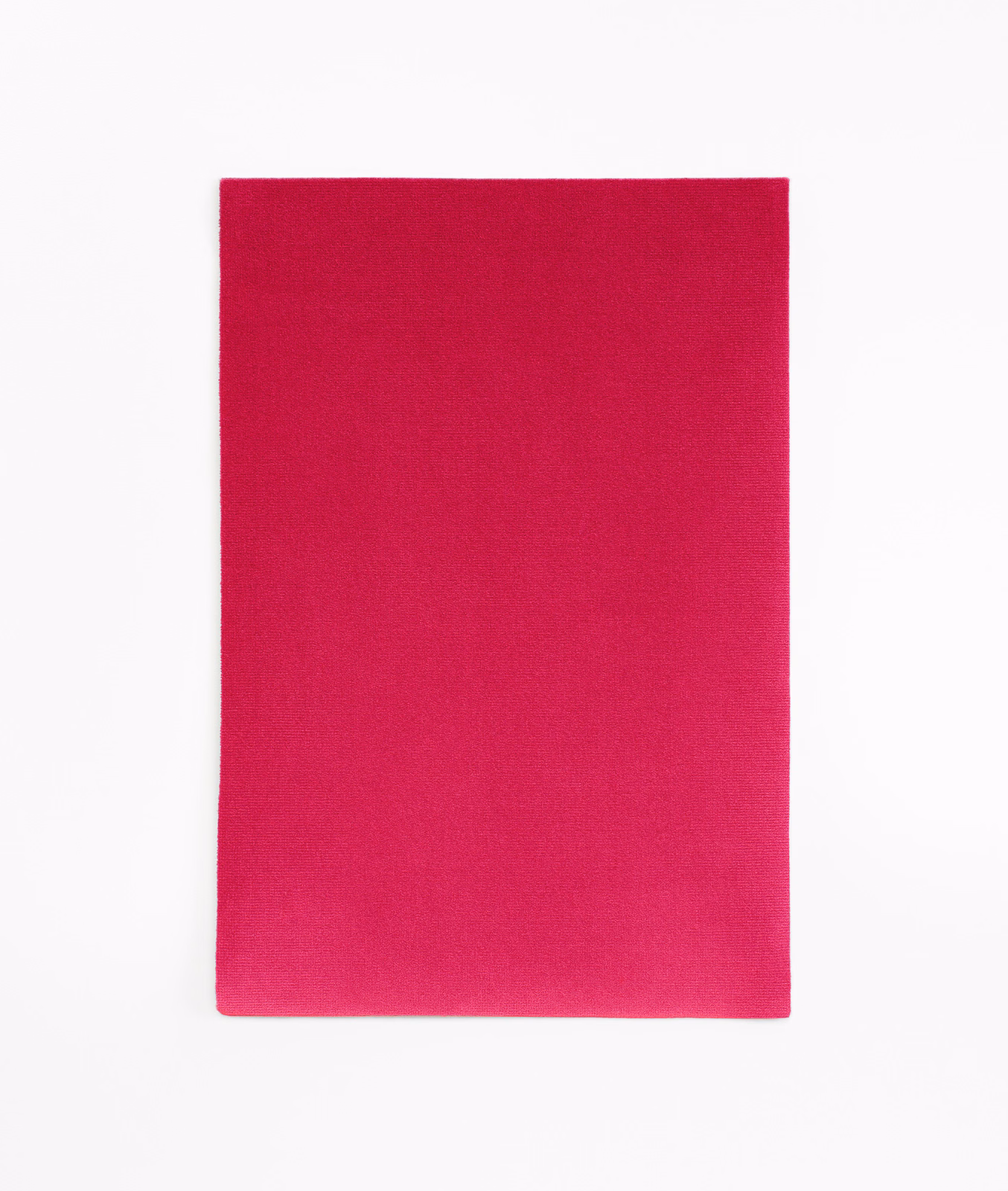 Saturated fuchsia pink velvet swatch with a plain, softly shifting nap