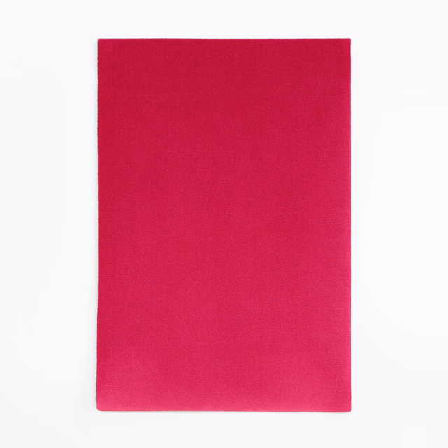 Saturated fuchsia pink velvet swatch with a plain, softly shifting nap