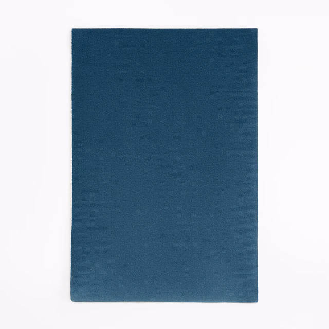 Deep indigo-blue velvet swatch showing a soft, subtly shifting pile
