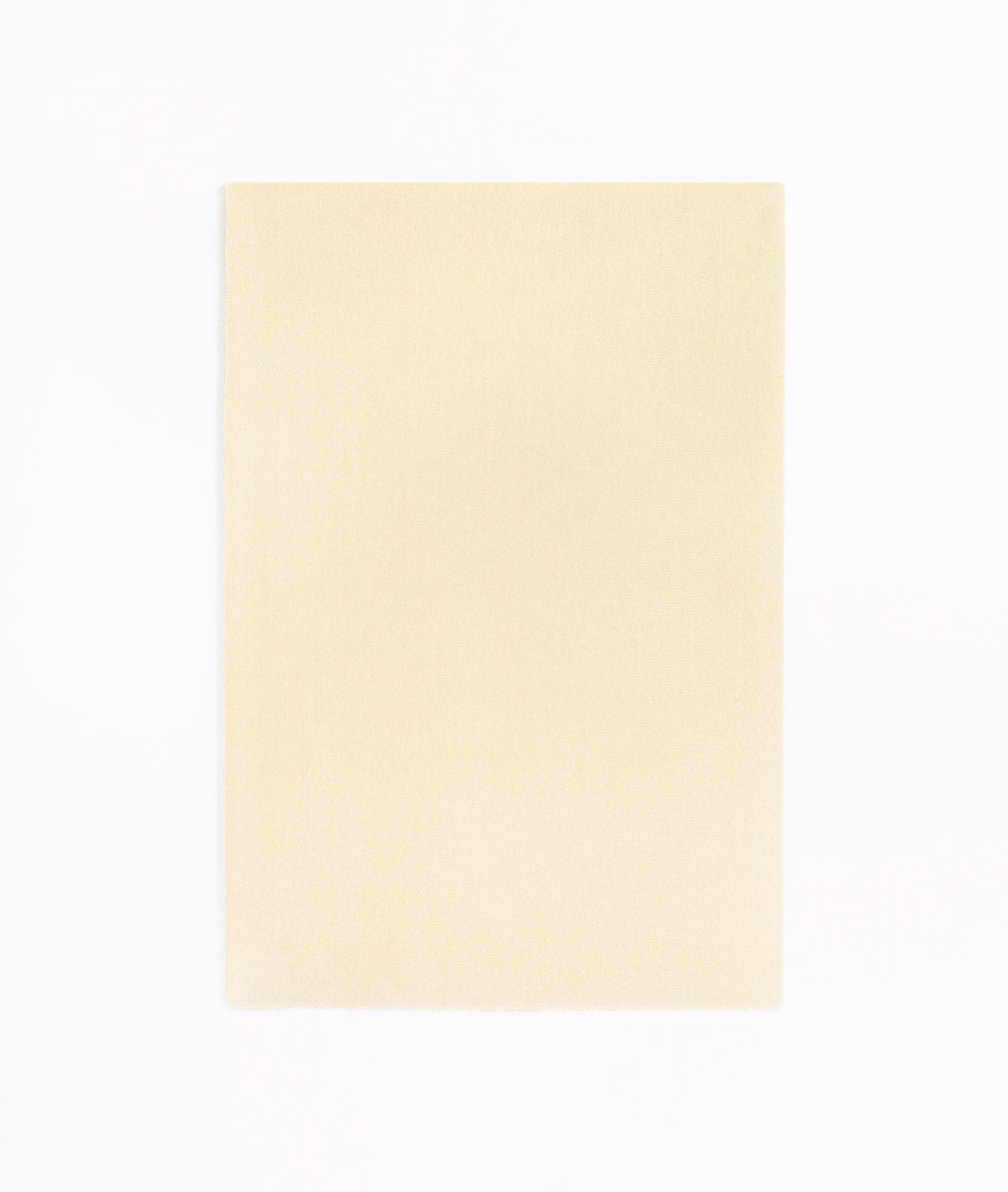 Pale Meringa ivory velvet swatch showing a soft, subtly directional nap