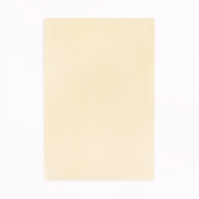 Pale Meringa ivory velvet swatch showing a soft, subtly directional nap