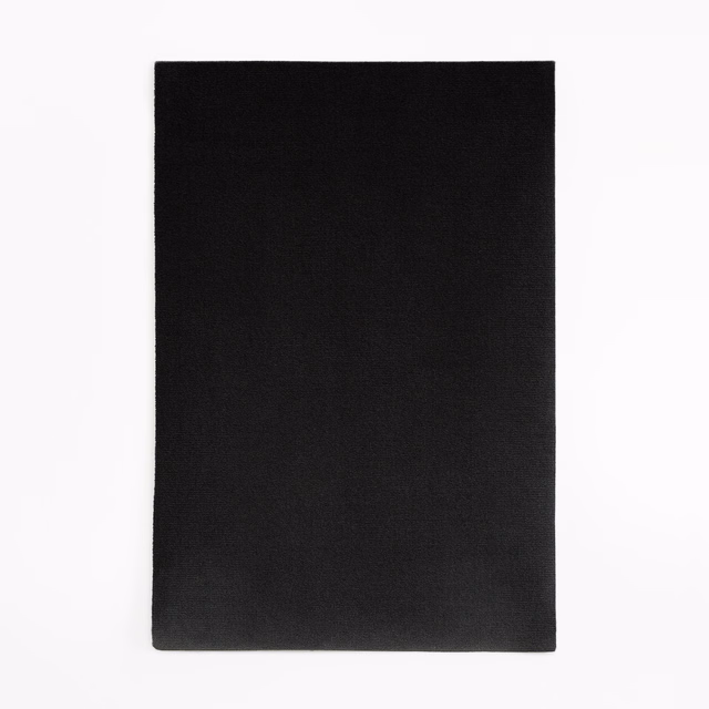 Deep black velvet swatch with subtle nap and softly shifting surface sheen