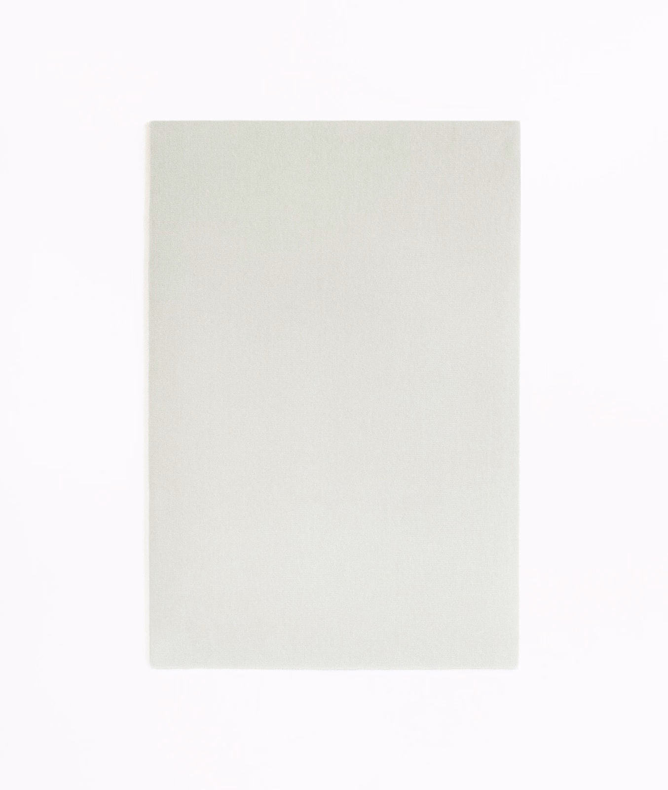 Pale pearl ivory velvet swatch with a softly shaded plain pile
