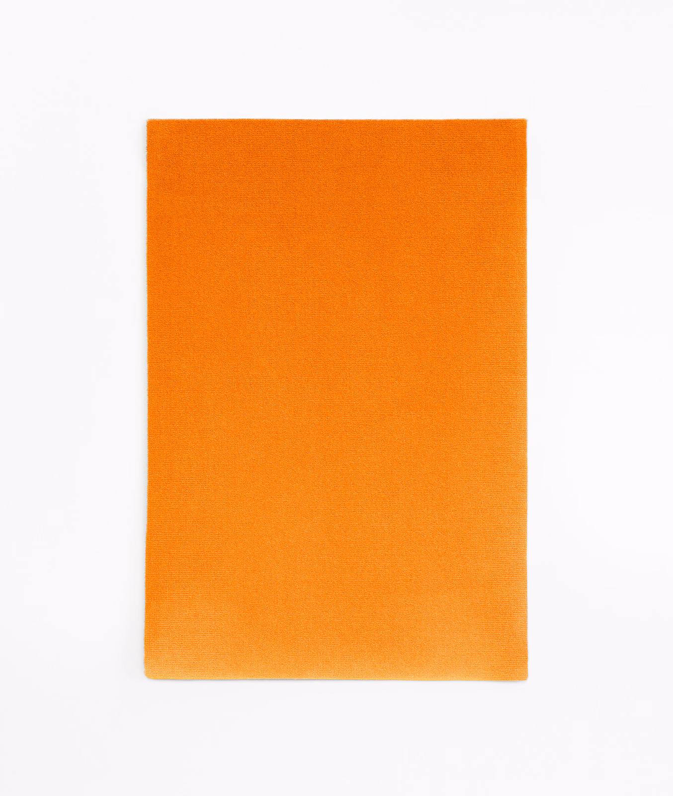 Plain pumpkin-orange velvet swatch with a softly changing, light-catching nap