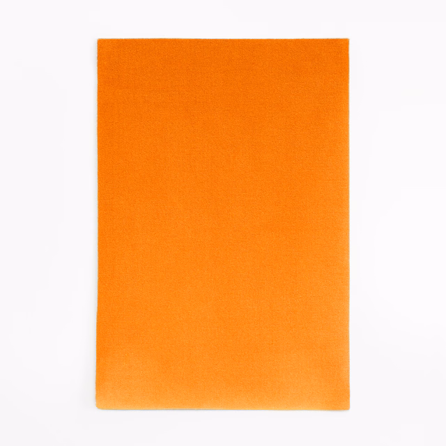 Plain pumpkin-orange velvet swatch with a softly changing, light-catching nap