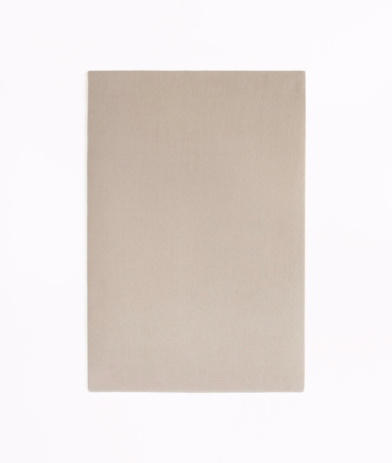 Pale warm taupe velvet swatch with a smooth, subtly brushed plain surface