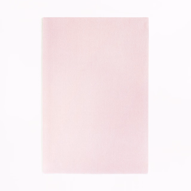 Pale blush pink velvet swatch showing a softly brushed, subtly tonal surface