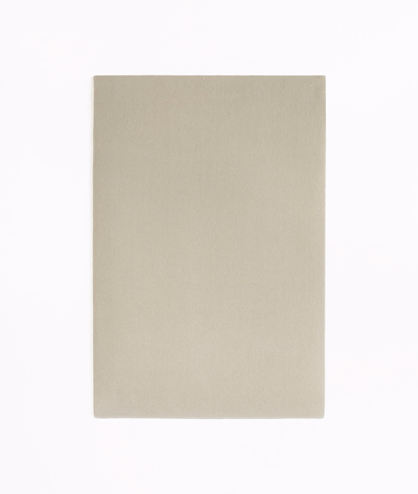 Soft sandy beige velvet with a quiet fine nap and even unpatterned surface