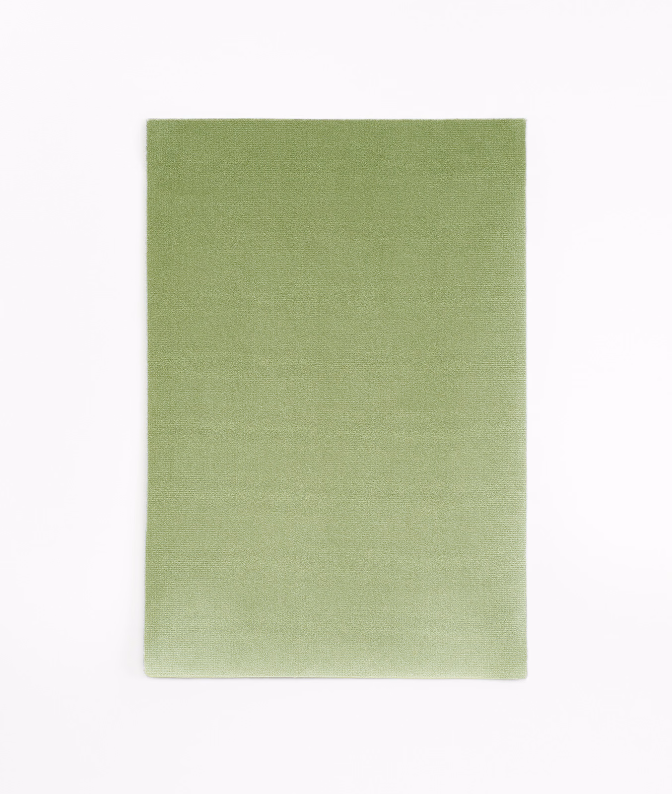 Muted sage-green velvet swatch showing soft pile and subtle tonal shading
