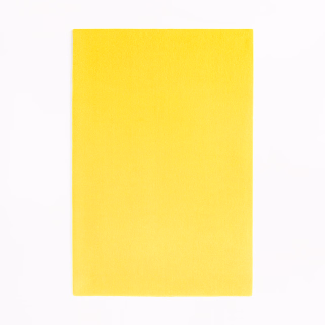 Vivid Soleil yellow velvet swatch with a softly brushed, light-catching surface