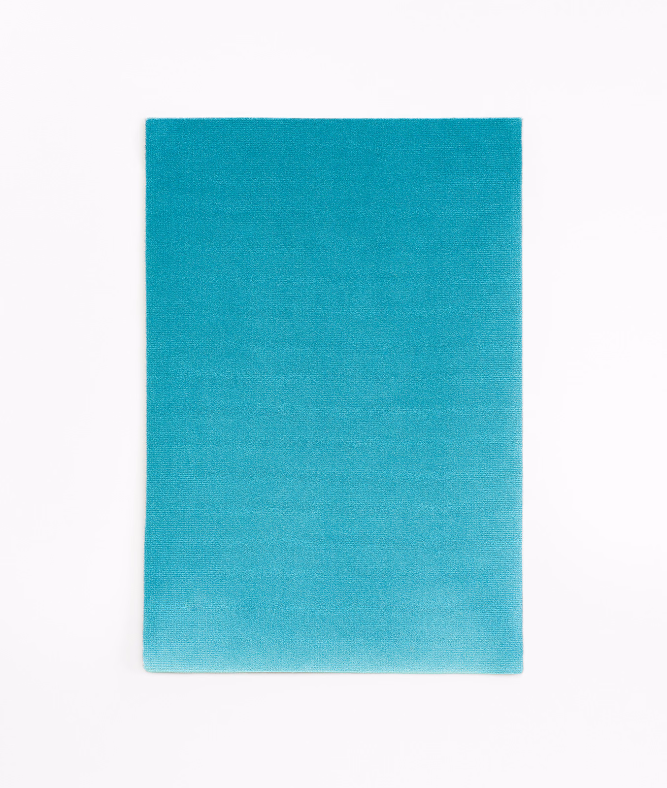 Saturated turquoise teal velvet swatch with a smooth nap and subtle aqua shading