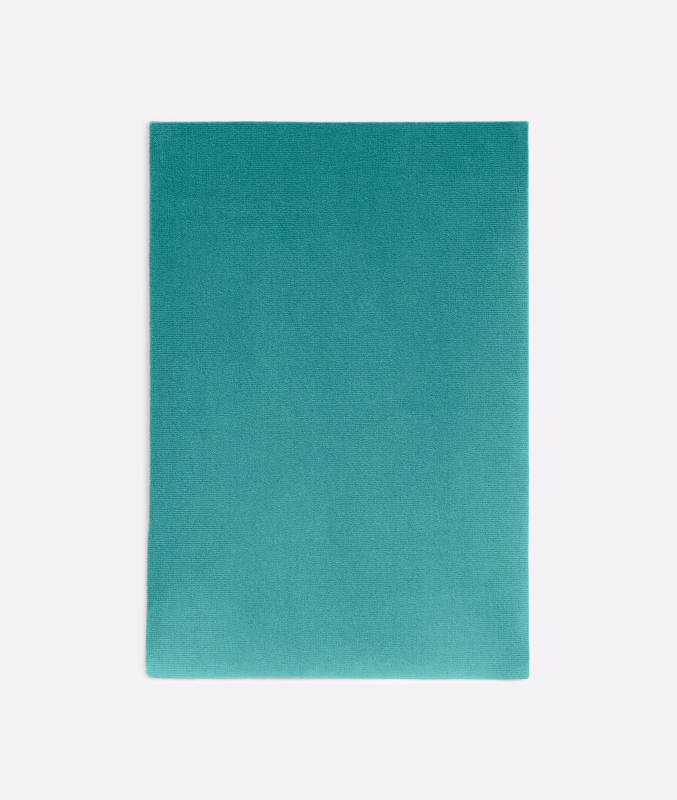 Saturated turquoise velvet swatch showing subtle directional nap and tonal shading