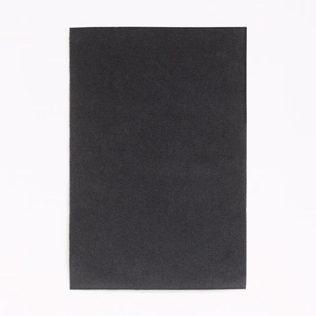 Deep anthracite velvet swatch showing a soft, subtly varied plain pile