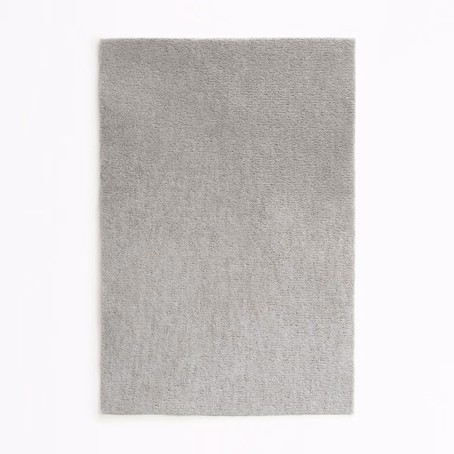 Cool silver-grey velvet swatch showing a soft, fine textured pile