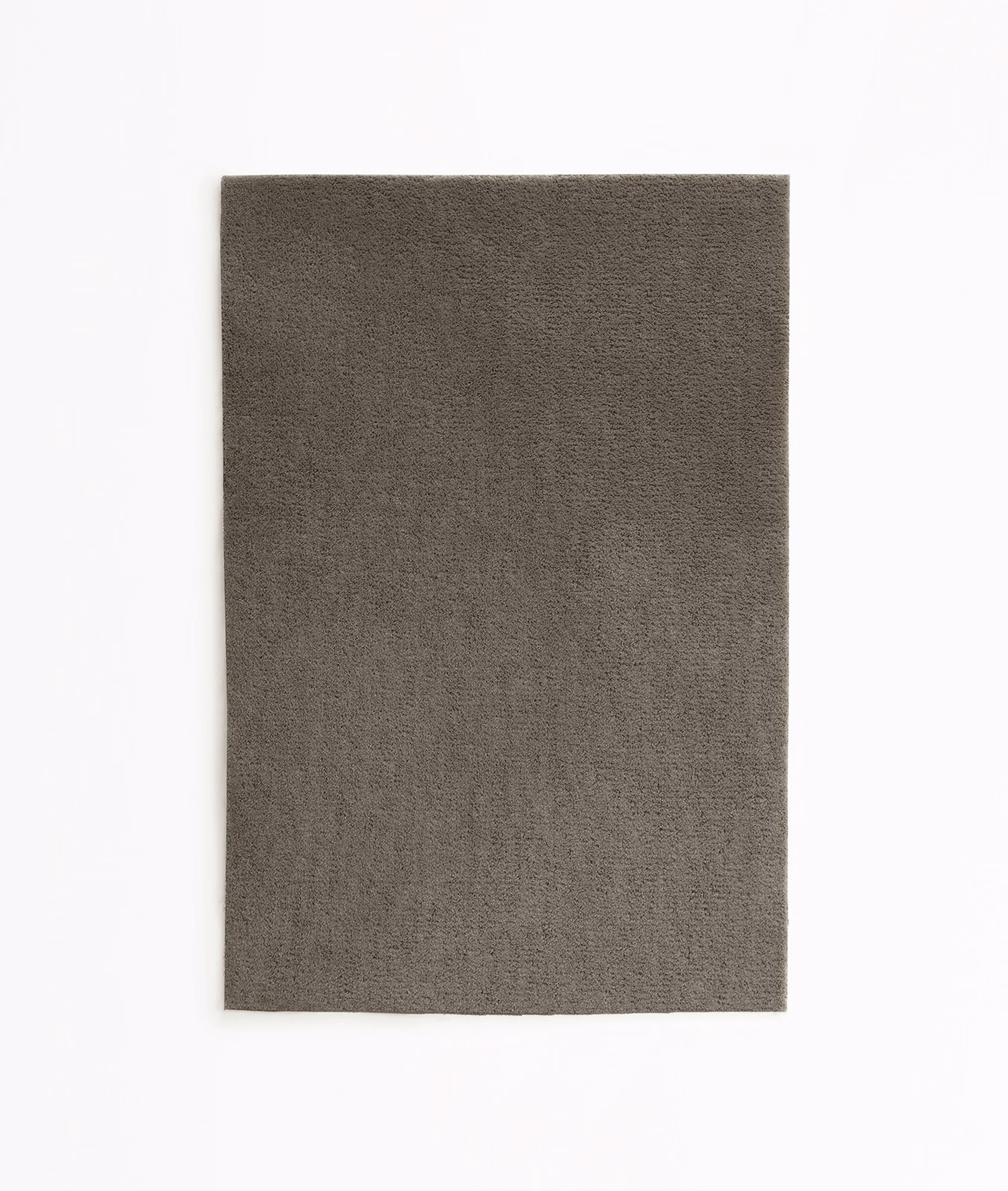Deep brown-taupe plain velvet swatch showing a softly directional short nap