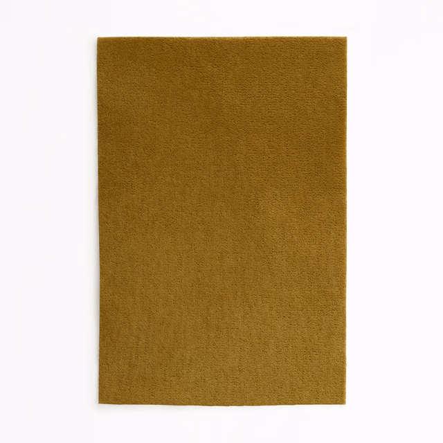 Warm ochre-gold velvet swatch with a softly shaded plain pile