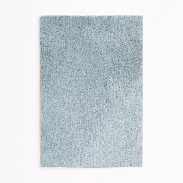 Pale glacier-blue velvet swatch with a soft, close-textured surface