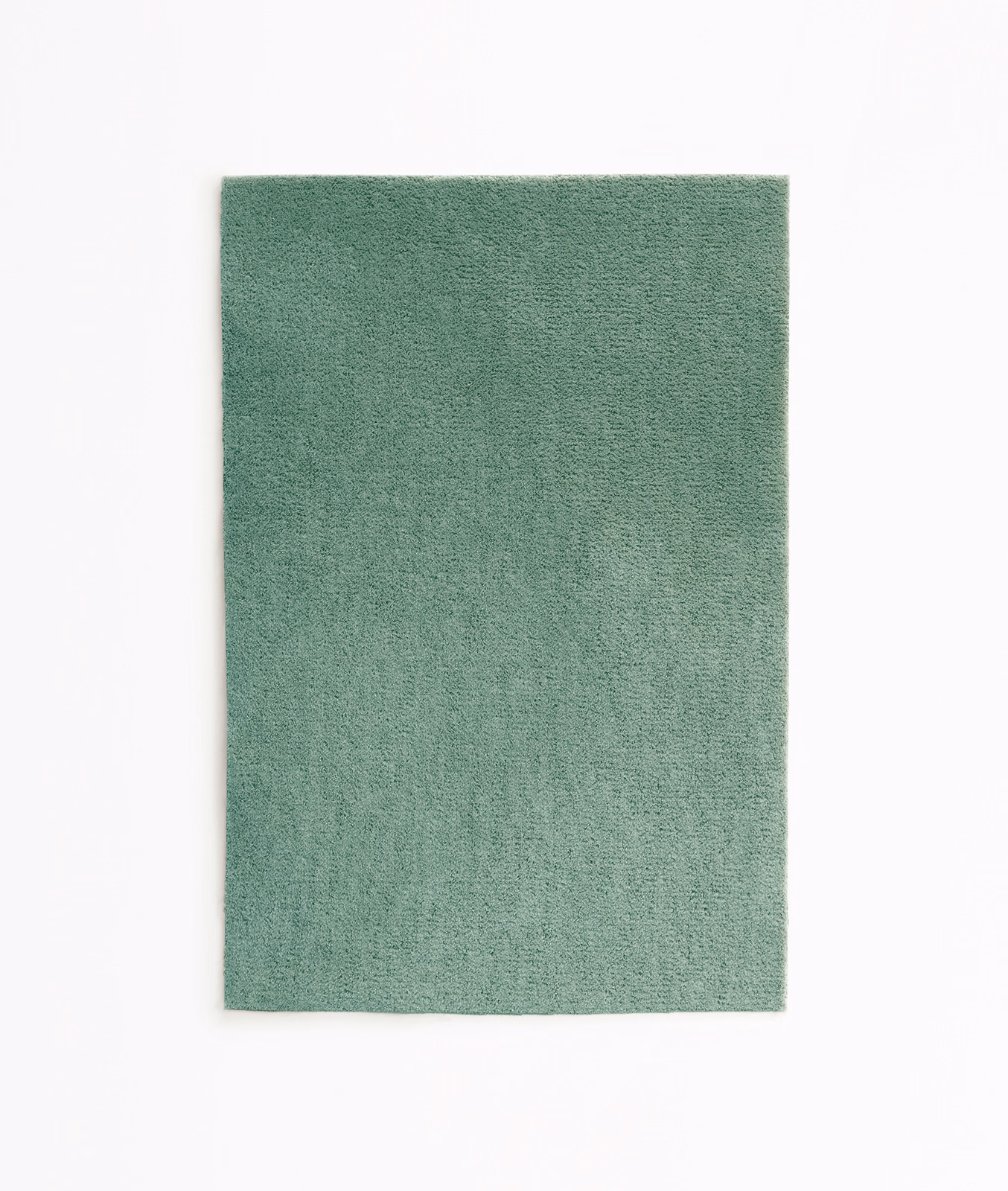 Muted jade-green velvet with a fine brushed nap and subtle light variation