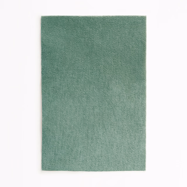 Muted jade-green velvet with a fine brushed nap and subtle light variation