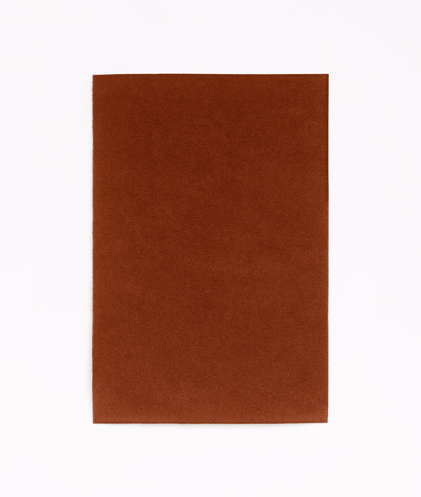 Deep brick-terracotta velvet swatch with an even, subtly light-catching pile