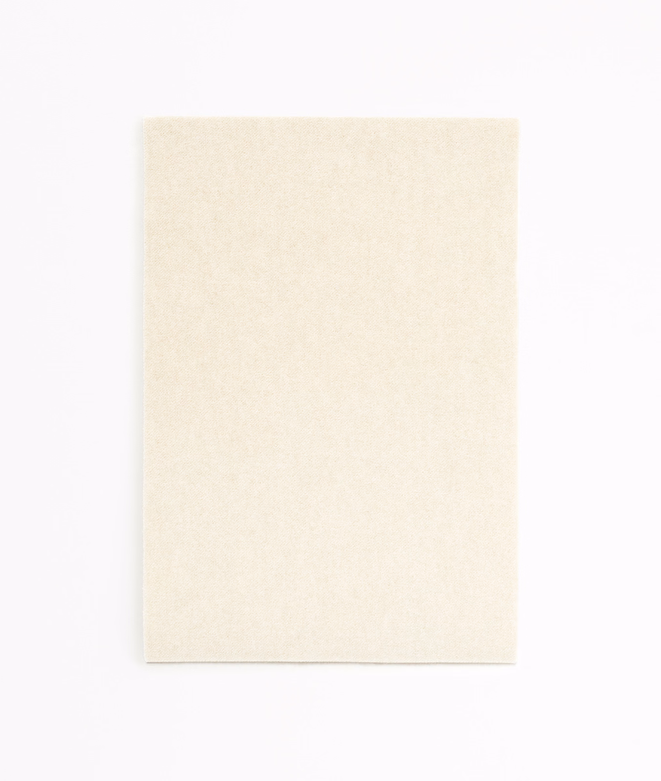 Pale ivory cream velvet swatch with subtle melanged texture and soft nap