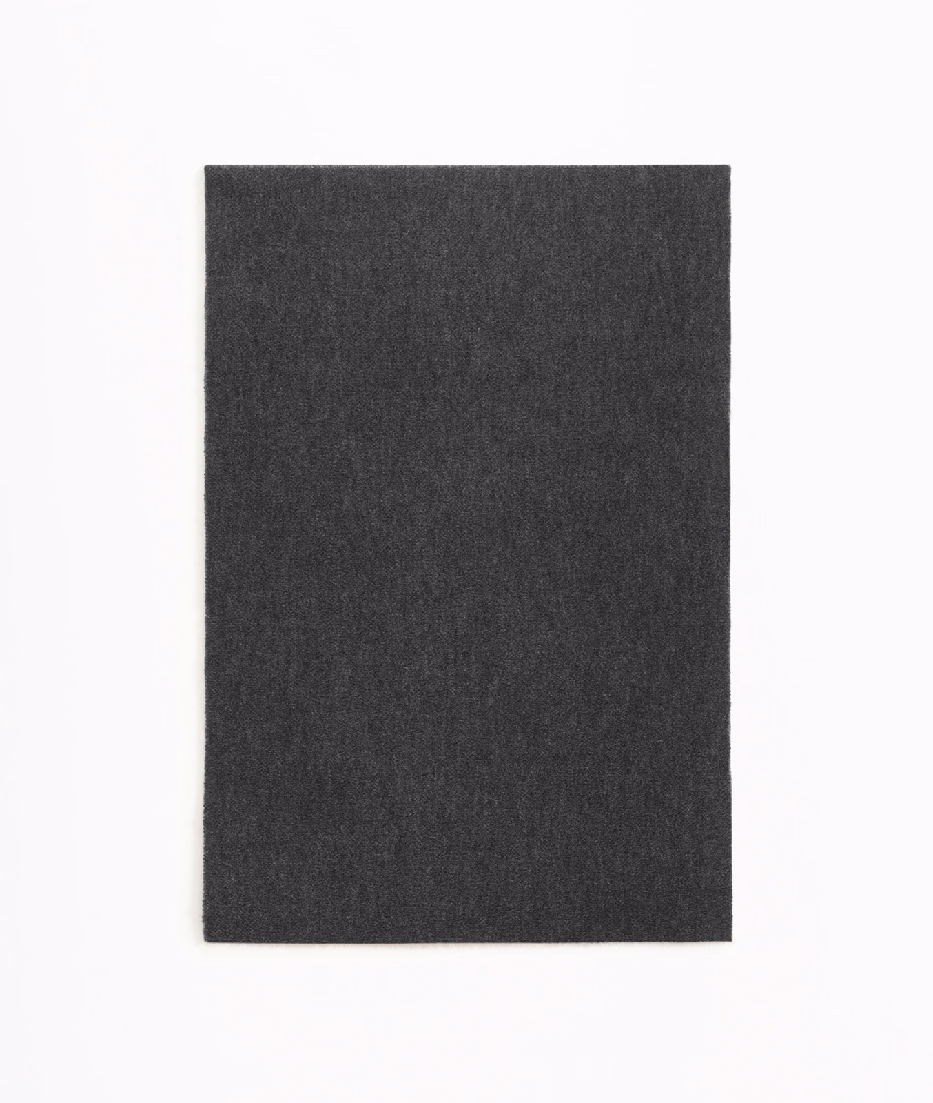 Deep charcoal velvet swatch with subtle vertical nap and softly mottled shading