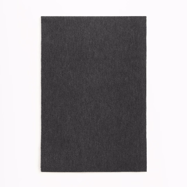 Deep charcoal velvet swatch with subtle vertical nap and softly mottled shading