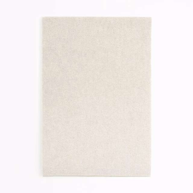 Pale ivory velvet swatch with a softly mottled, fine melange texture