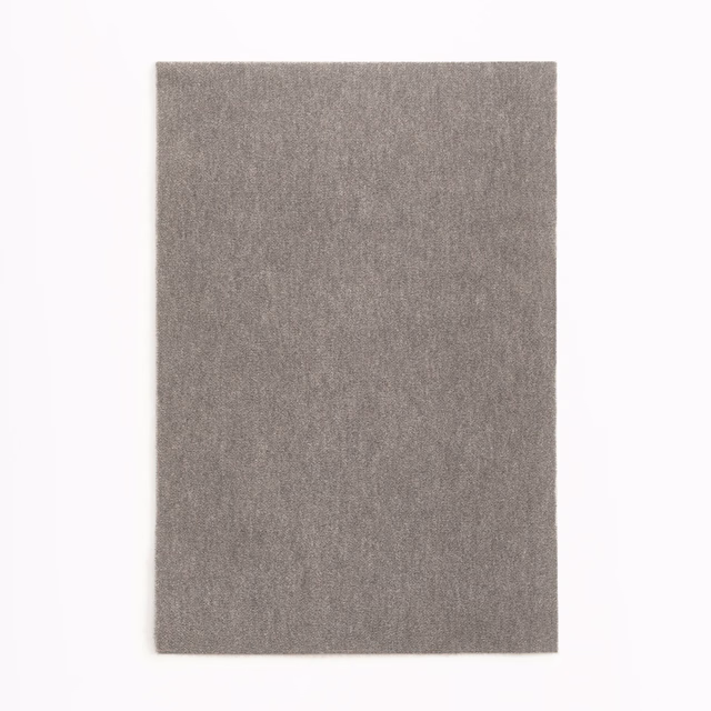 Warm stone taupe-grey velvet with a softly mottled, low-pile surface