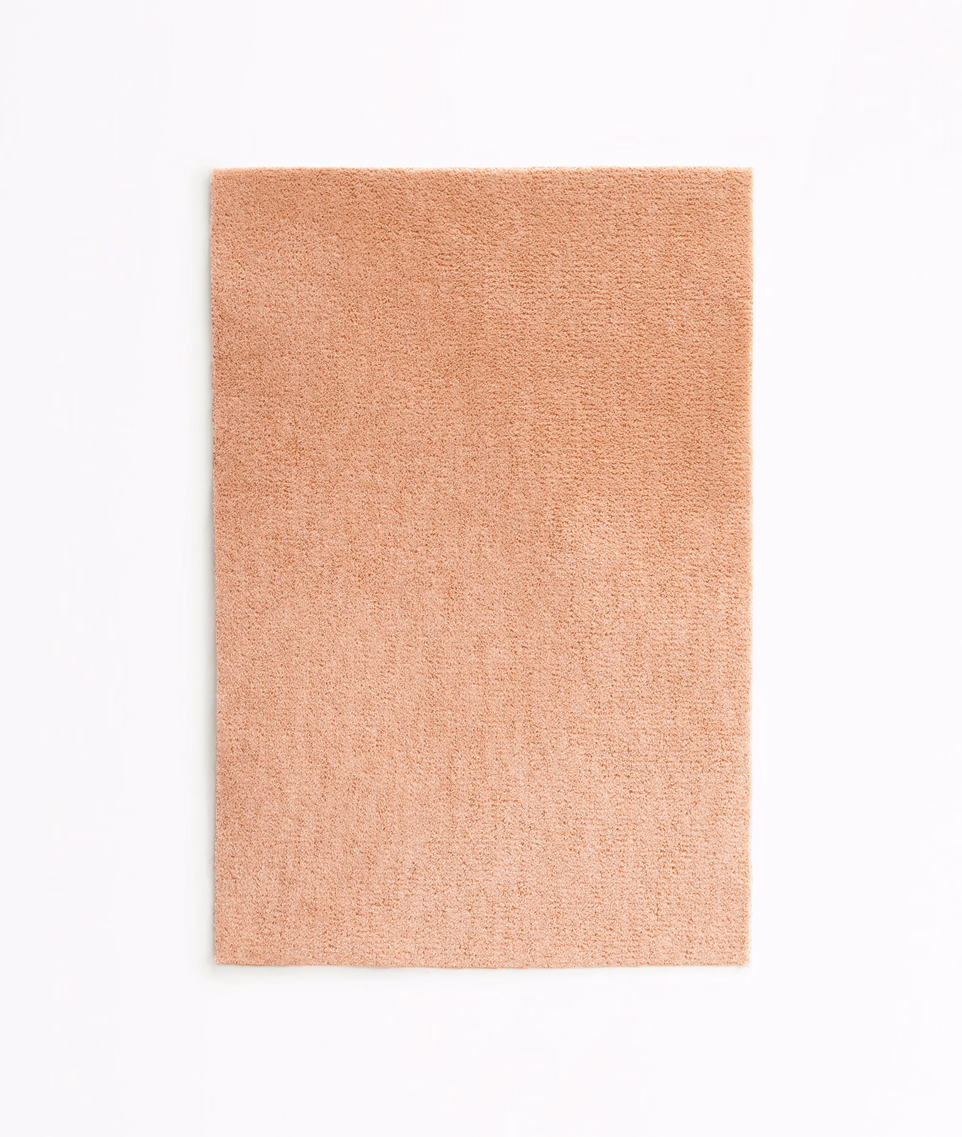 Warm naked-peach velvet swatch with a fine, softly brushed pile