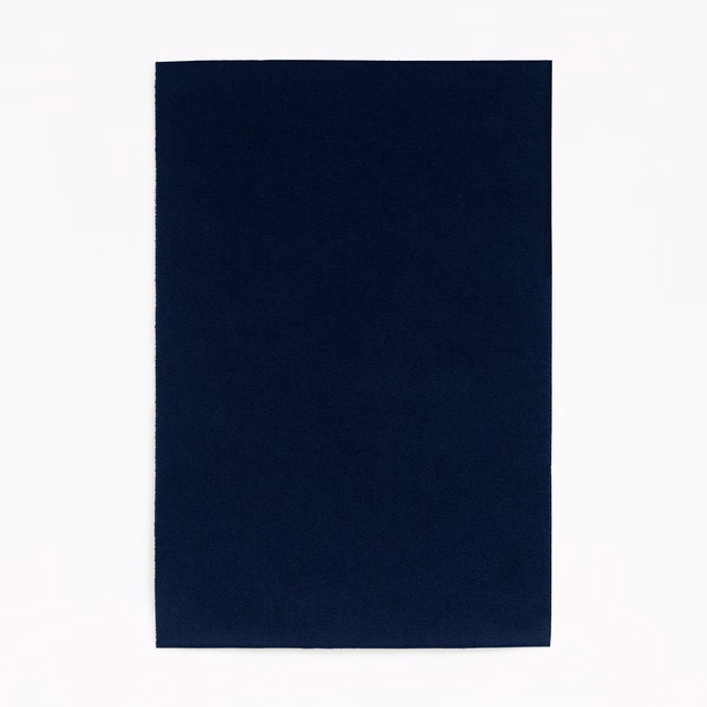 Deep ink navy velvet swatch with a plain, subtly light-catching pile