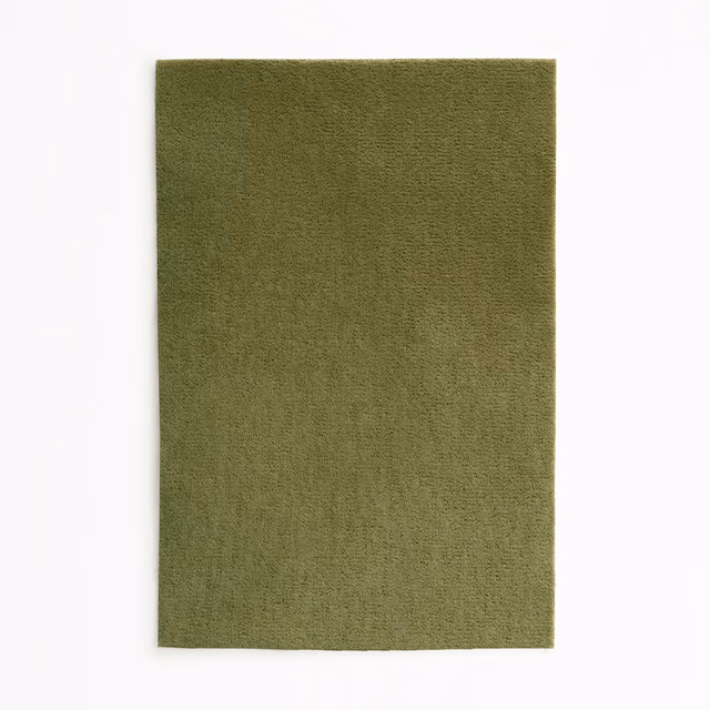 Muted olive-green velvet swatch showing short pile and subtle directional shading